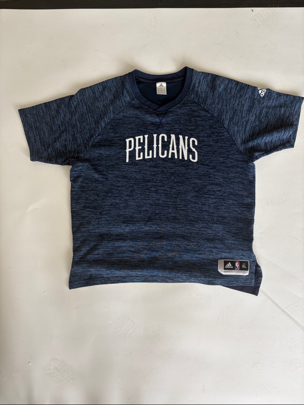 Adidas. New Orleans Pelicans warm up shirt.